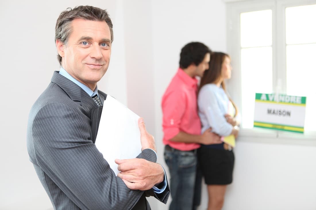 Young couple viewing property